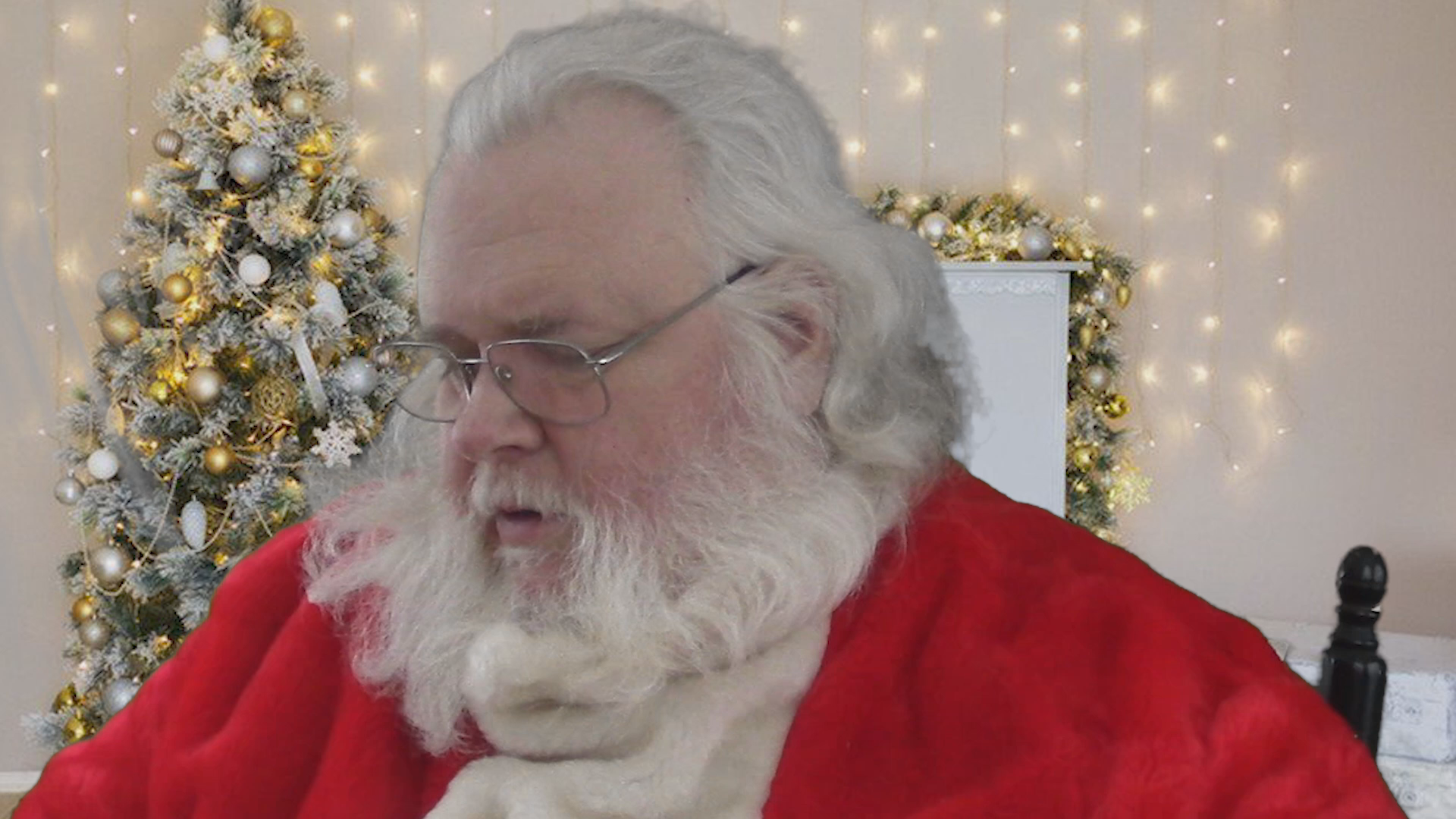 Thumbnail image for "Santa reading the story 'A Merry Christmas,' by Louisa May Alcott."
